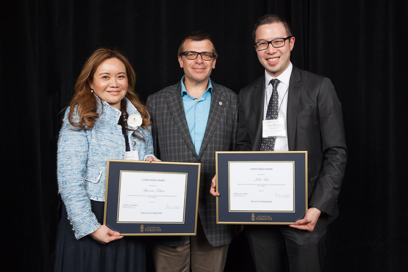 Vice Dean Spadafora presents Drs. Yvonne Chan and John Lee (Assistant Professor) with the Colin Woolf Award for Excellence in Course Coordination
