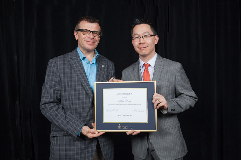 Vice Dean Spadafora presents Dr. Rene Wong with David Fear Fellowship Award